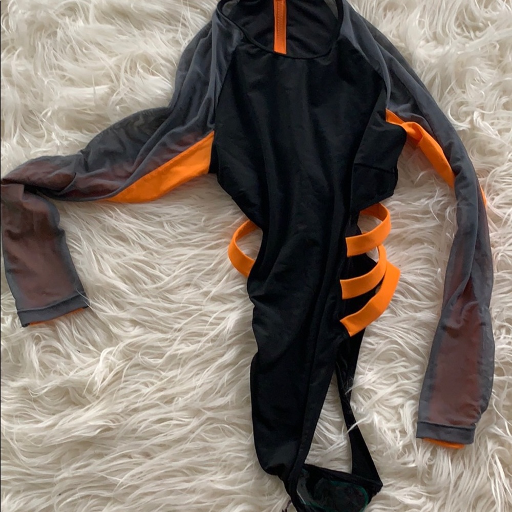 Black, orange and grey one piece swimsuit.